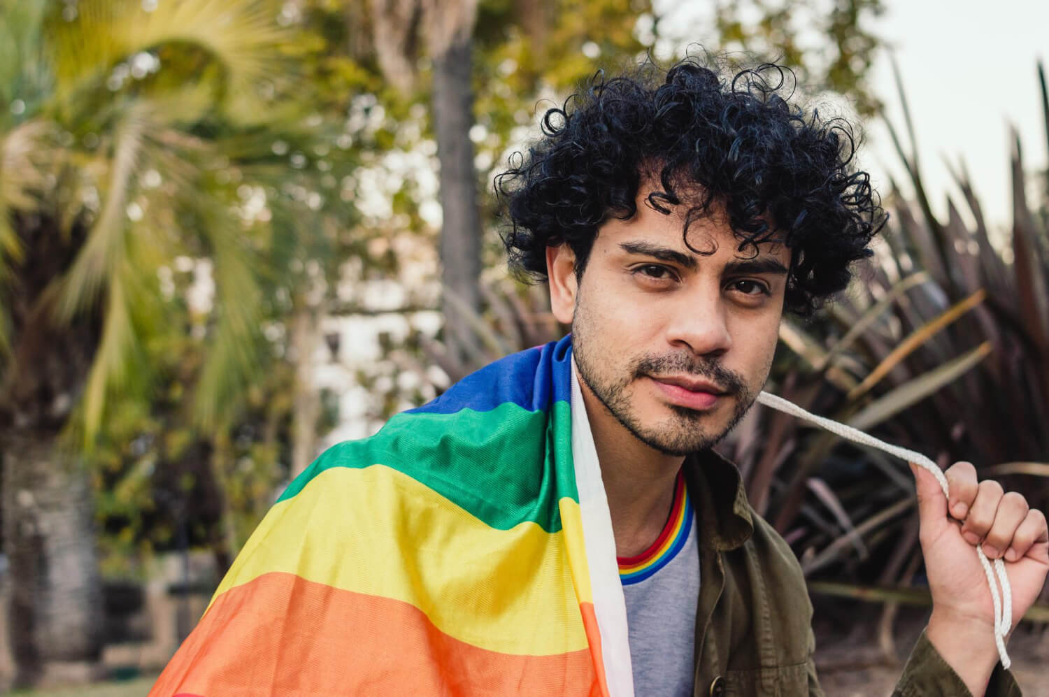 LGBTQ Gay man with a pride flag